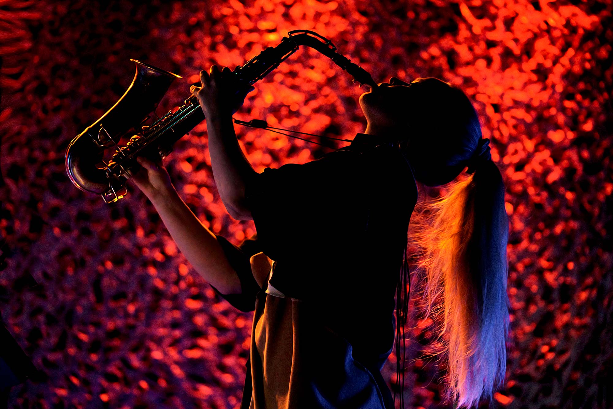 Mette Rasmussen playing sax